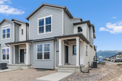 View of front of property featuring brick siding and a mountain view