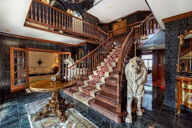 Foyer entrance with polished granite tile floors a