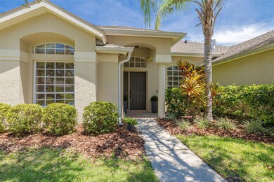 The lush tropical plantings and mature trees create a private oasis while showcasing the meticulous care throughout this exceptional property.