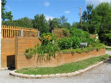 YEAR ROUND BLOOMING PLANTS IN THE RETAINING WALL
