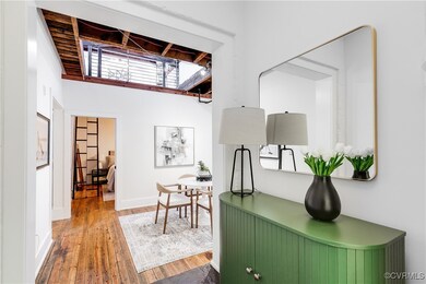 Foyer with half bath to the left.