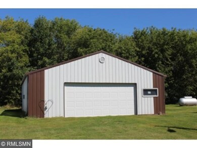 40 x 32 tin shed with tin roof, dirt floor, automa