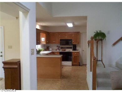 Kitchen - This bright kitchen has cork flooring, w