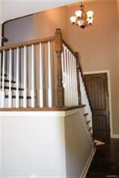 Beautiful foyer with the stair landing and turn!