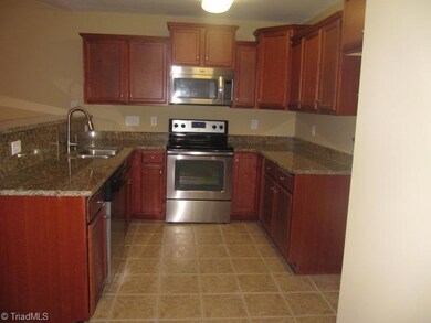 Kitchen. Granite Counters, Stainless Appliances, Hardwood Floors