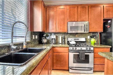 Imagine cooking in this bright and upgraded kitche