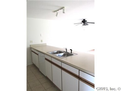 Kitchen. CERAMIC FLOORING....LOTS OF STORAGE SPACE