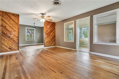 From front door, looking through Living Room to Di