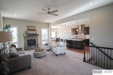 OPEN AND INVITING LIVING ROOM.