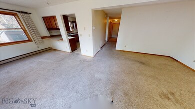 Living room/dining room from the rear of home
