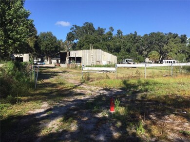 This 2 acre fenced property has it all. Outbuilding #1 is bigger than the main house.  Under its roof you will find a 2 stall horse barn and open tack room, a one car garage, along with a workshop with bay door.  But wait**There's MORE** Also a small
