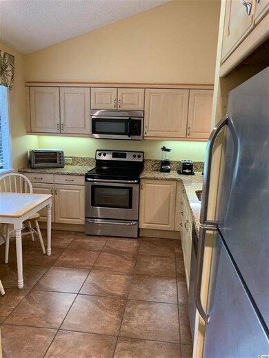 LARGE KITCHEN WITH UPGRADED CABINETS, GRANIOTE, AN