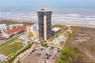 Bird's eye view featuring a water view, a view of the beach, and a city view