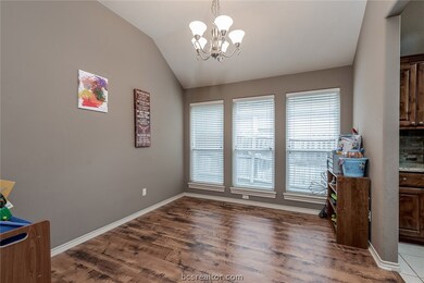Formal Dining room, presently being used as a play room for the children.  10'7