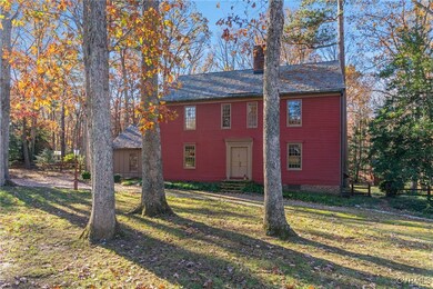 View of front of property featuring a front yard