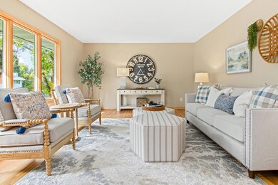 Open to the entry space is the sun filled living room.