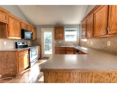 Kitchen walks out to a nice sized deck