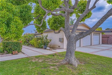 Front view of complex, 1 garage space on L. Side