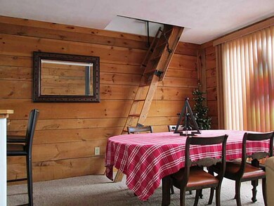 Dining Room. Stairs to the loft area are behind th