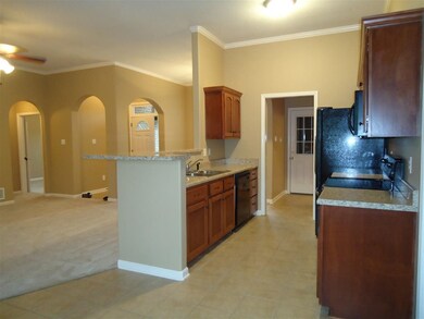 Visit with family while you cook with this open plan. New dishwasher & frig.