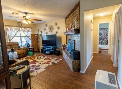 Down the hall are the 3 bedrooms and 2 baths.
