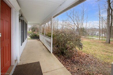 View of patio featuring a porch