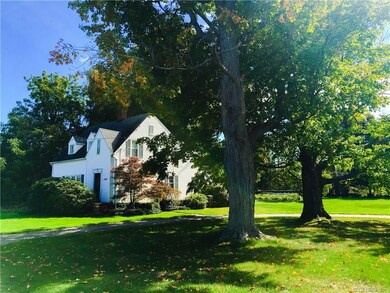 mature trees/circular driveway