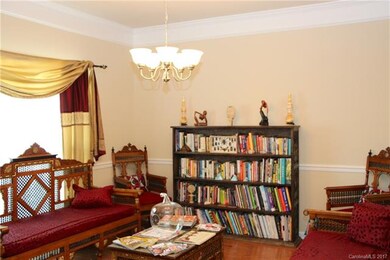 This formal living space makes the perfect library