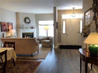 PICTURE PERFECT LIVING ROOM WITH ADJOINING DINING