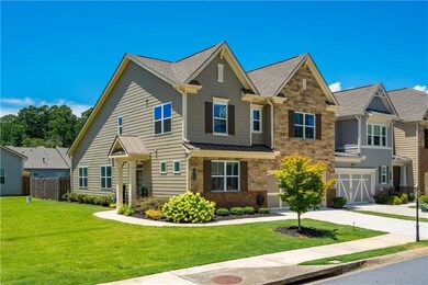 Side of home showing attached large grassy area