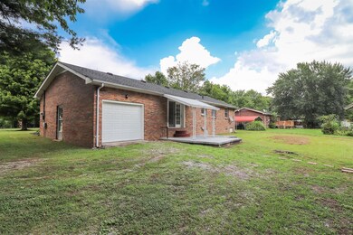 Single Car Garage Attached with Nice Covered Patio  104 Wind Curve Cir