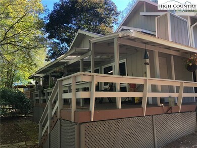 Covered back deck along the Watauga River.