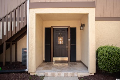 Property entrance featuring central air condition 