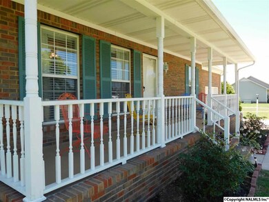A southern style covered front porch for a warm welcome for family and friends.