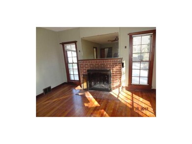 Living Room. Woodburning Fireplace