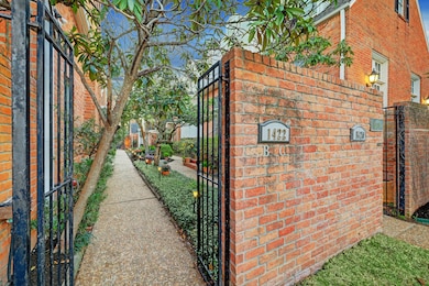 Enter the property through this brick wall and iro