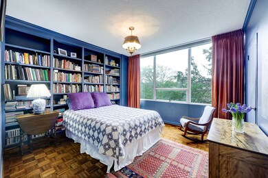 Second bedroom or flex room. Custom book shelves,