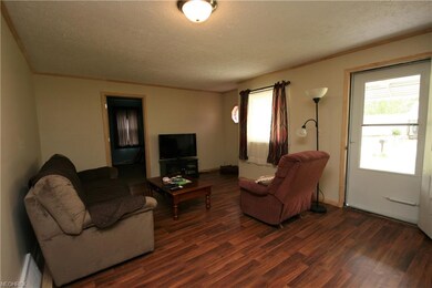 The living room has all new drywall (replaced pane