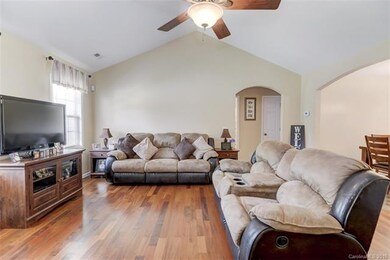 Spacious living room with wood floors