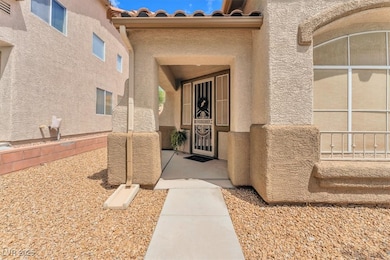View of exterior entry with stucco siding