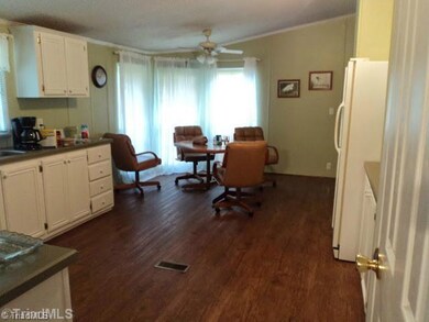 Kitchen. Eat in kitchen. The kitchen has been remodeled and appliances stay. Even the furnishing are negotiable.