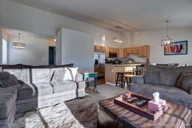 Open living area with vaulted ceilings