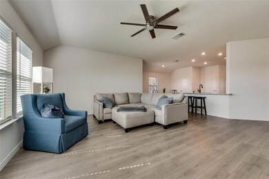 Living area overlooks backyard.