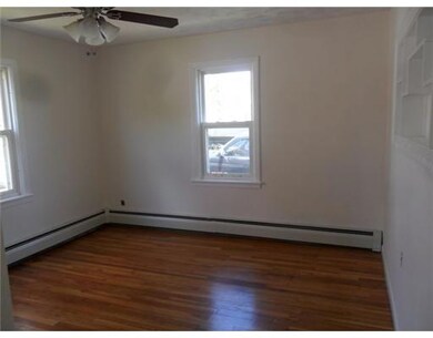 Dining Room. ROOMY DINING ROOM WITH HARDWOODS