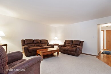 Spacious living room will fit the entire family.