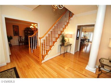 Foyer - Spacious foyer with gleaming hardwood floo