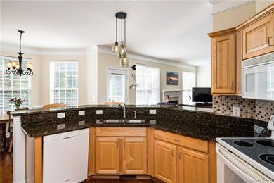 Great kitchen layout with sink, stove, and refrige