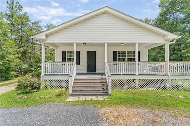 Bungalow featuring covered porch