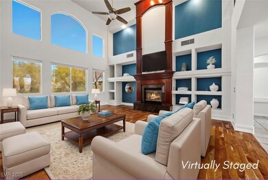 Living area featuring built in features, ceiling f