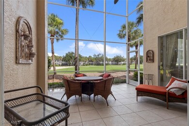 Sunroom featuring golf course view
